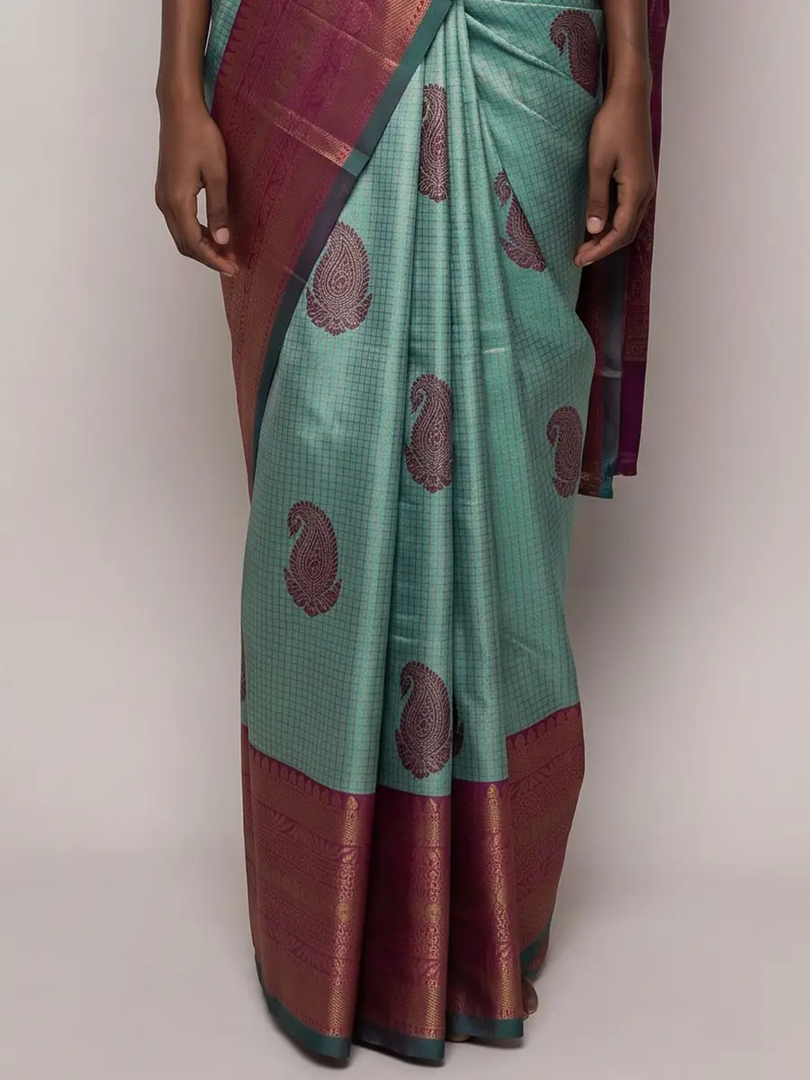 Close crop of the same model's pleats and border